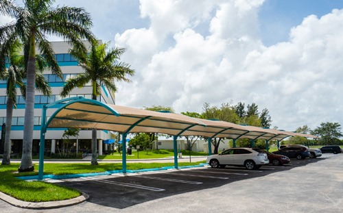 Car park shade outlet structures