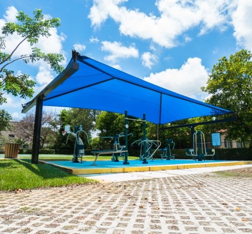 blue parking shade covering kid's playground