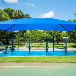 Blue Shade Structure covering tennis court