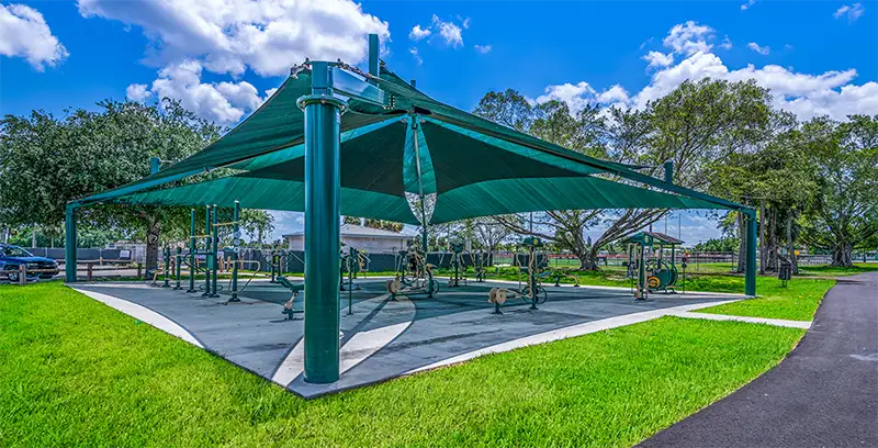 Shade structures offer shade for outdoor fitness amenities, protecting both people and property from the harmful effects of the sun.